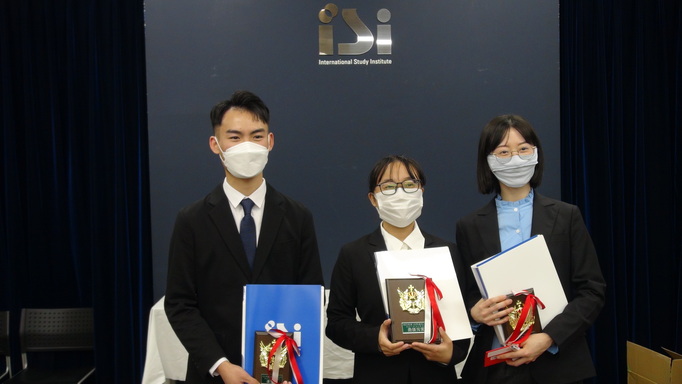 The three winners of the Grand Prize and the Award of Excellence. They were very happy.